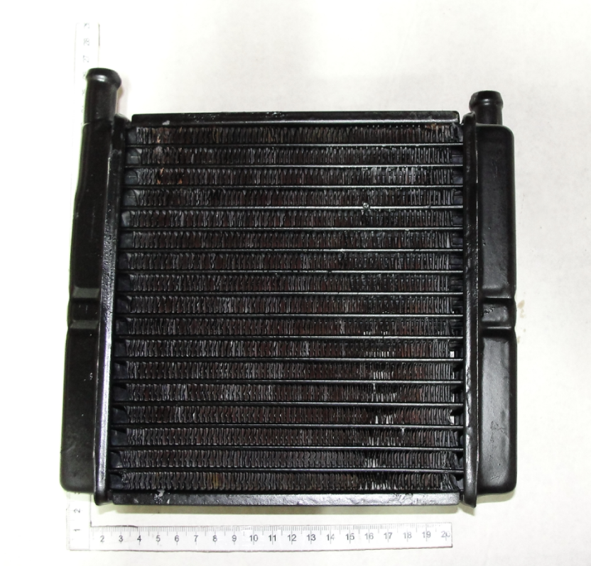 МТЗ Радиатор отопителя медн. 80-8101060 патрубки в одну сторону (мал.кабина)